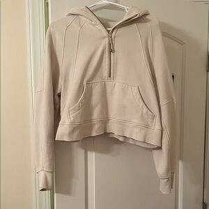 Lululemon Size Xs/S cropped bone scuba with gold zipper/logo